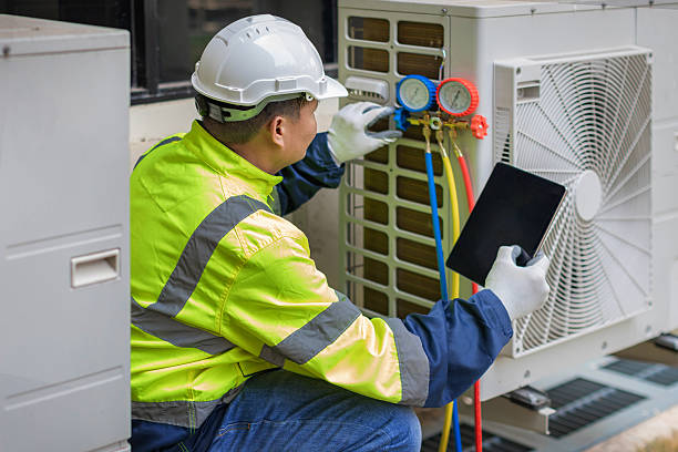 Professional Hvac technician working in South Hamilton, MA